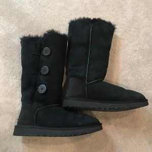 Black tall Uggs. Bailey style with the buttons.