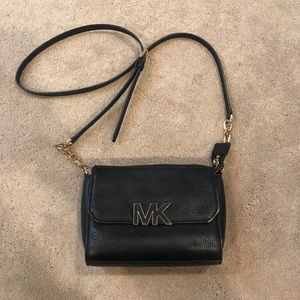 Michael Kors small over the shoulder purse.