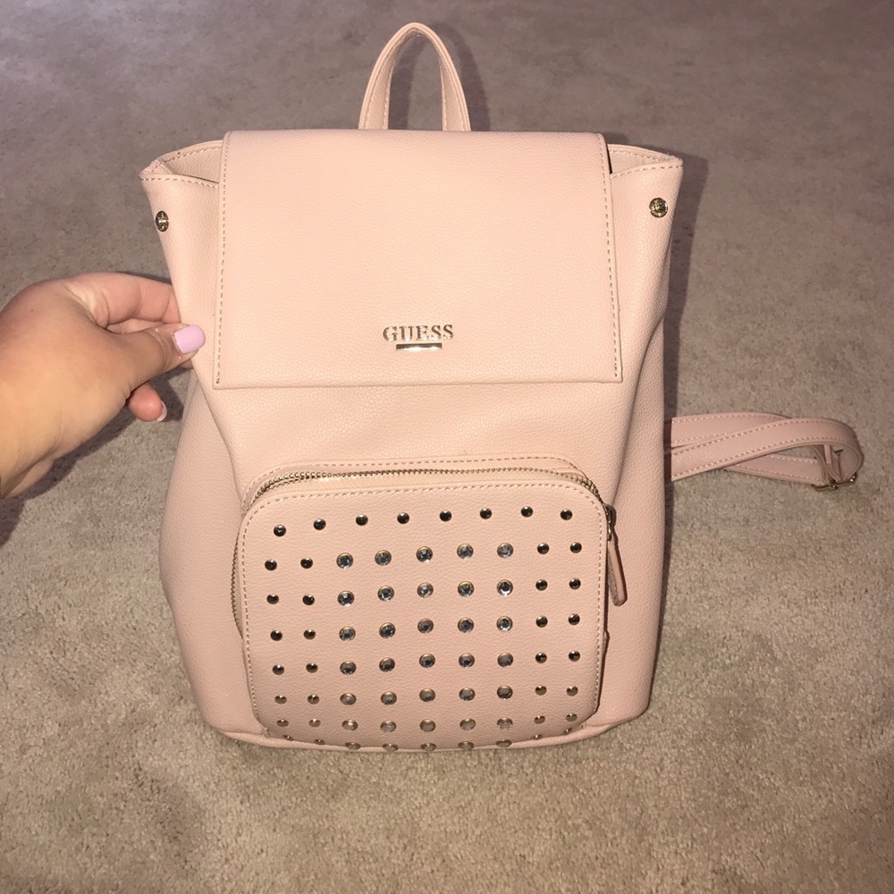 Light pink Guess backpack with gold gems