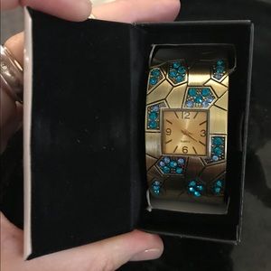 Avon’s Blissful Blues Cuff Watch