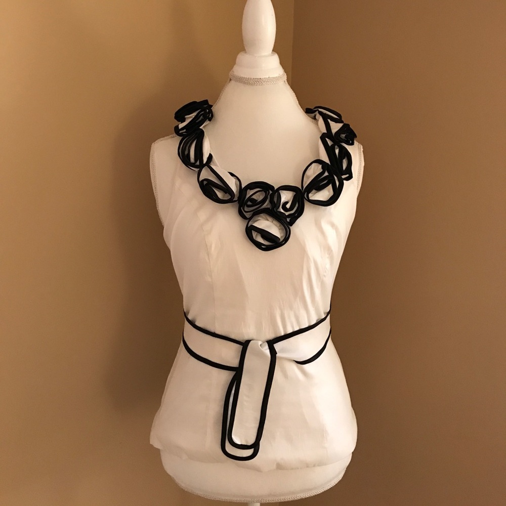 White with black rosettes top