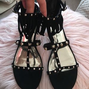 Jennifer Lopez black and gold sandals