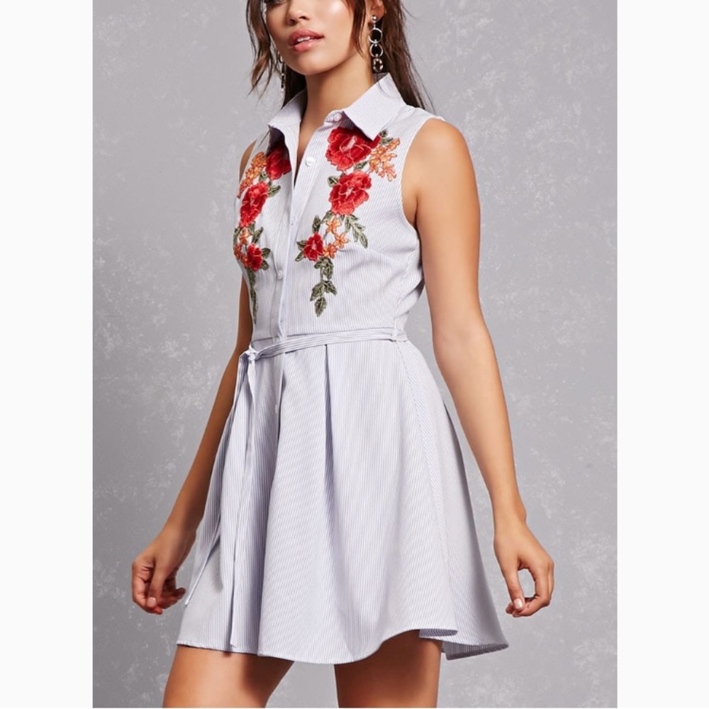 Shirt dress featuring a floral embroidery
