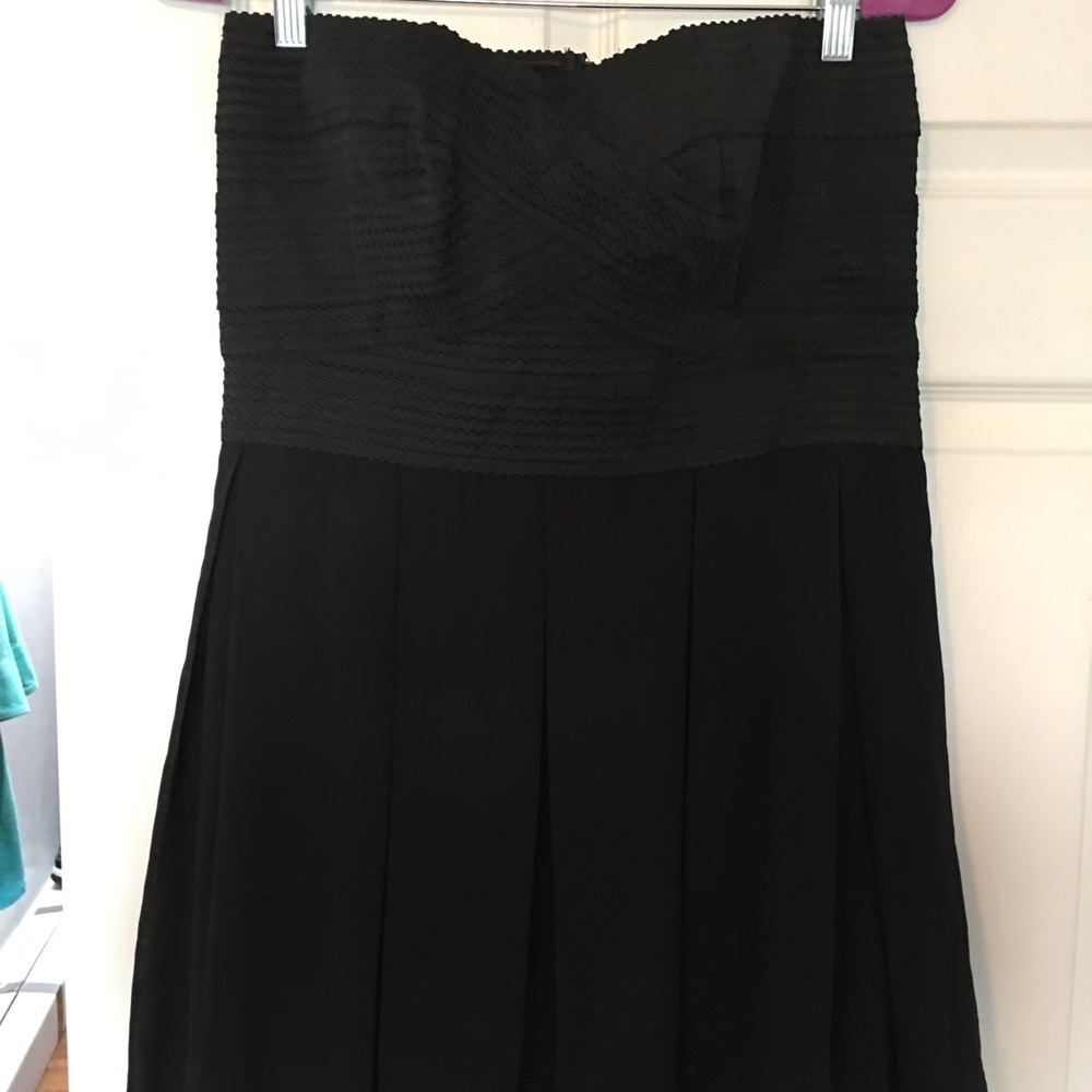 Black mini dress with bondage top detail