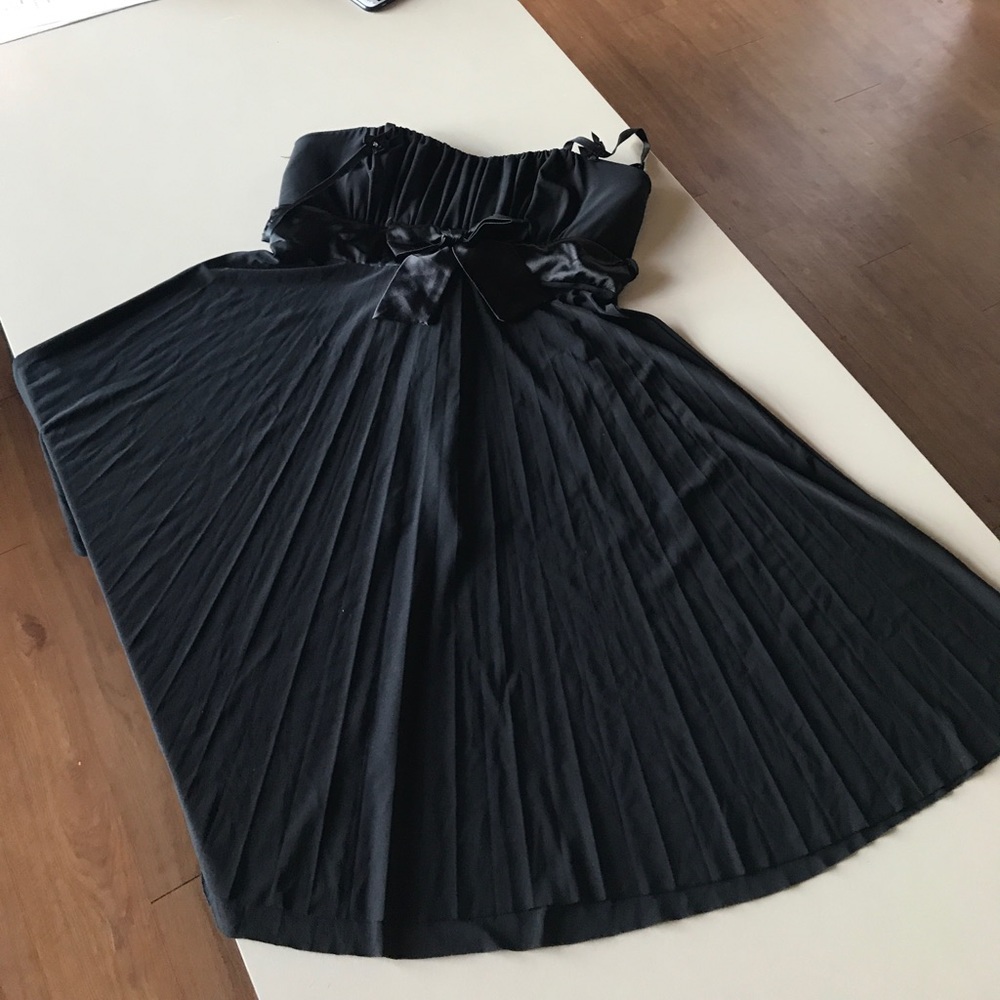 Black flowing bow dress