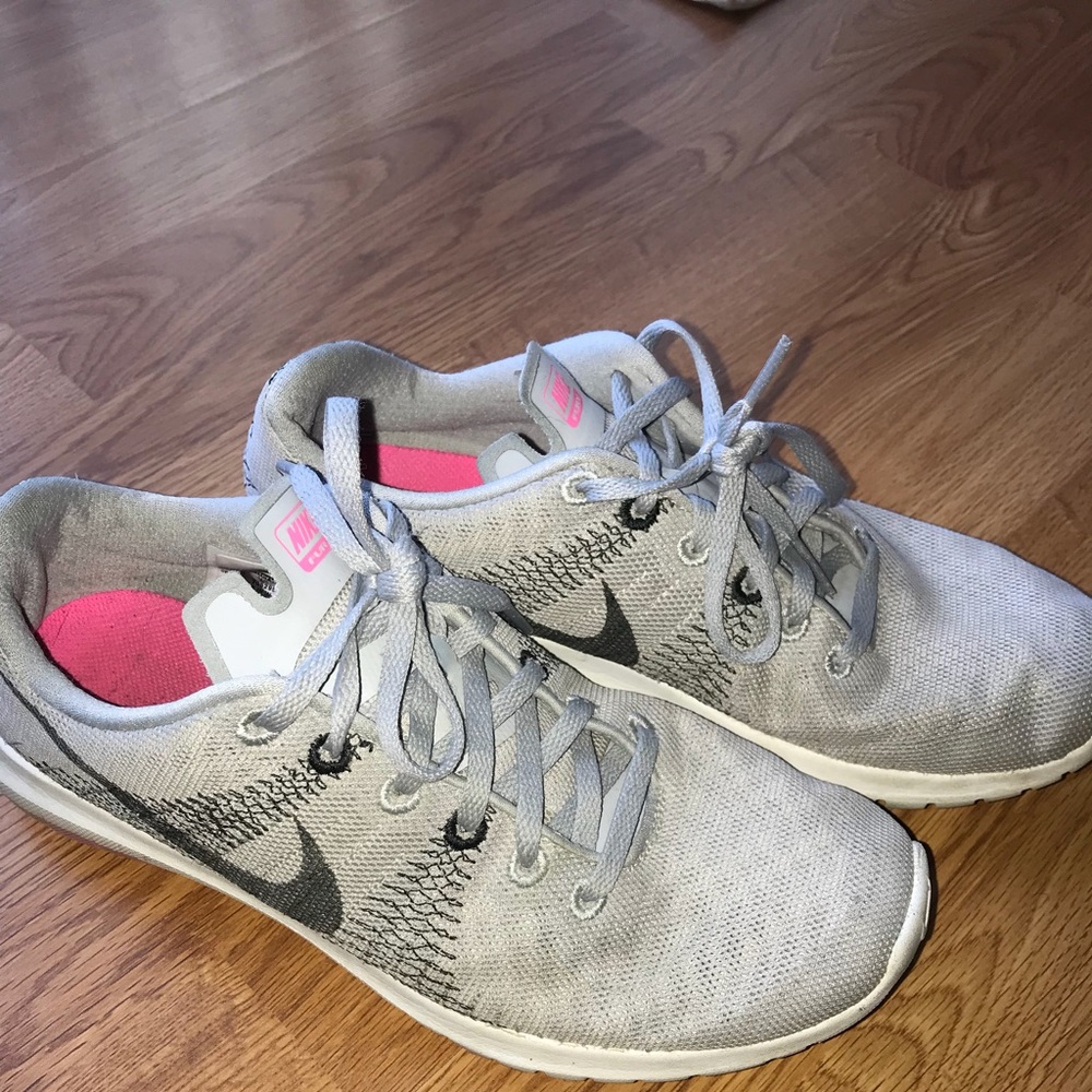 Women’s gray Nike running shoes
