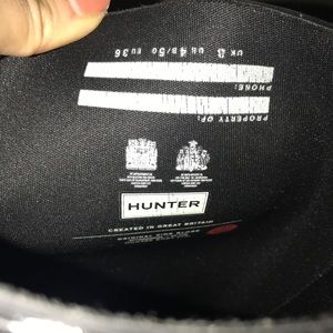 Black glossy hunter boots