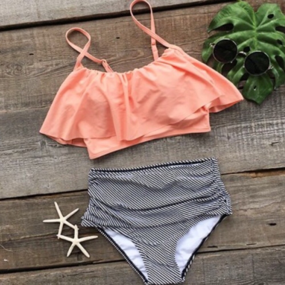 Peach ruffle top and striped bottom swimsuit