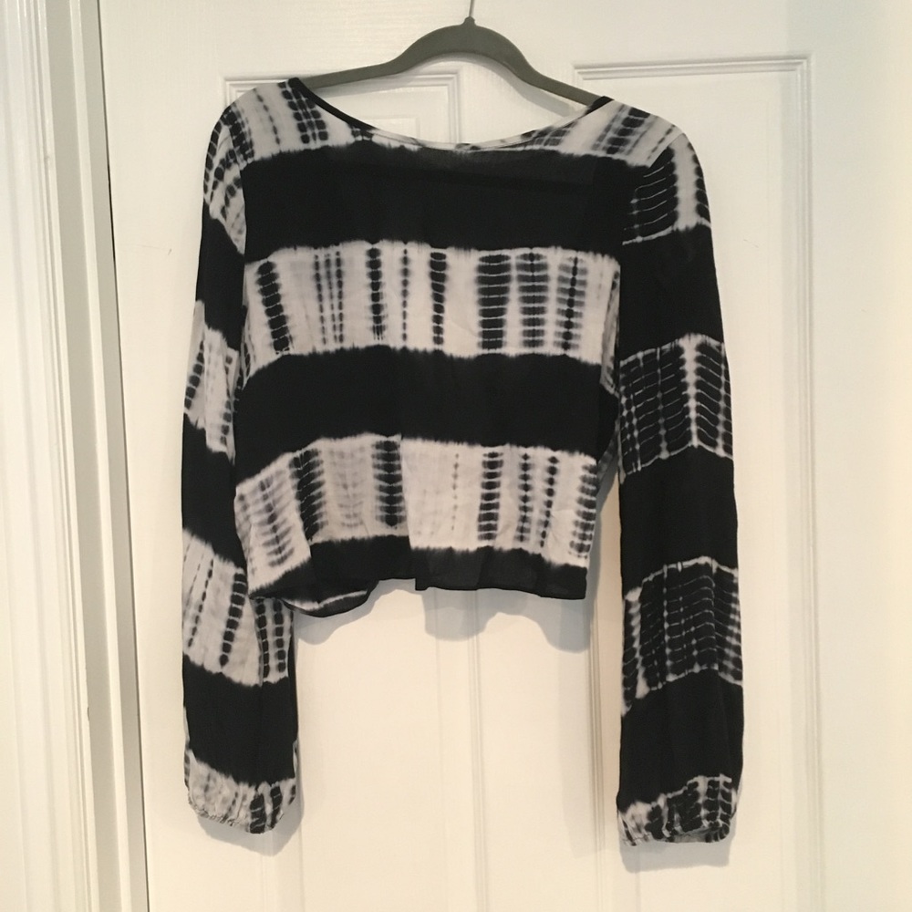 Flowy long sleeve crop top with a twisty back