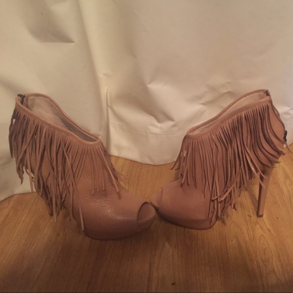 Never been worn peep toe heels (size 8.5).