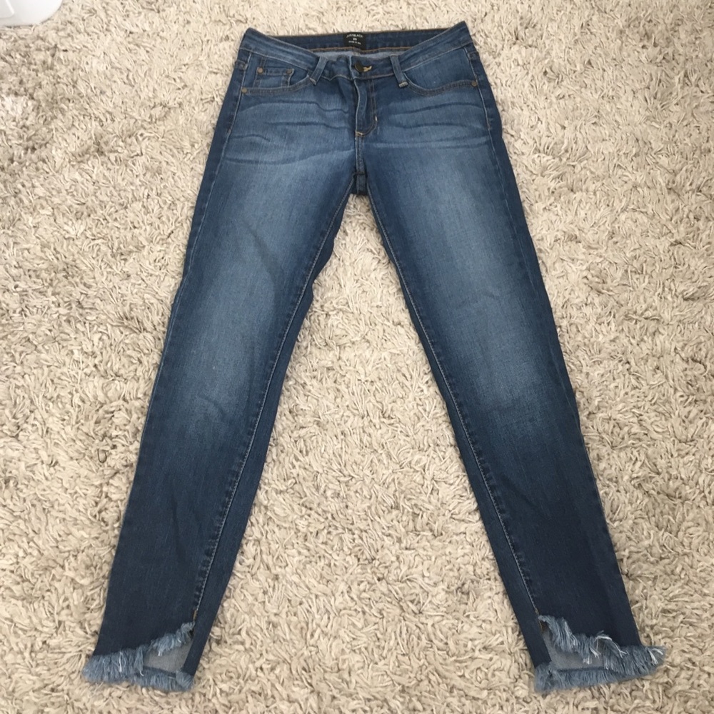Frayed blue jeans