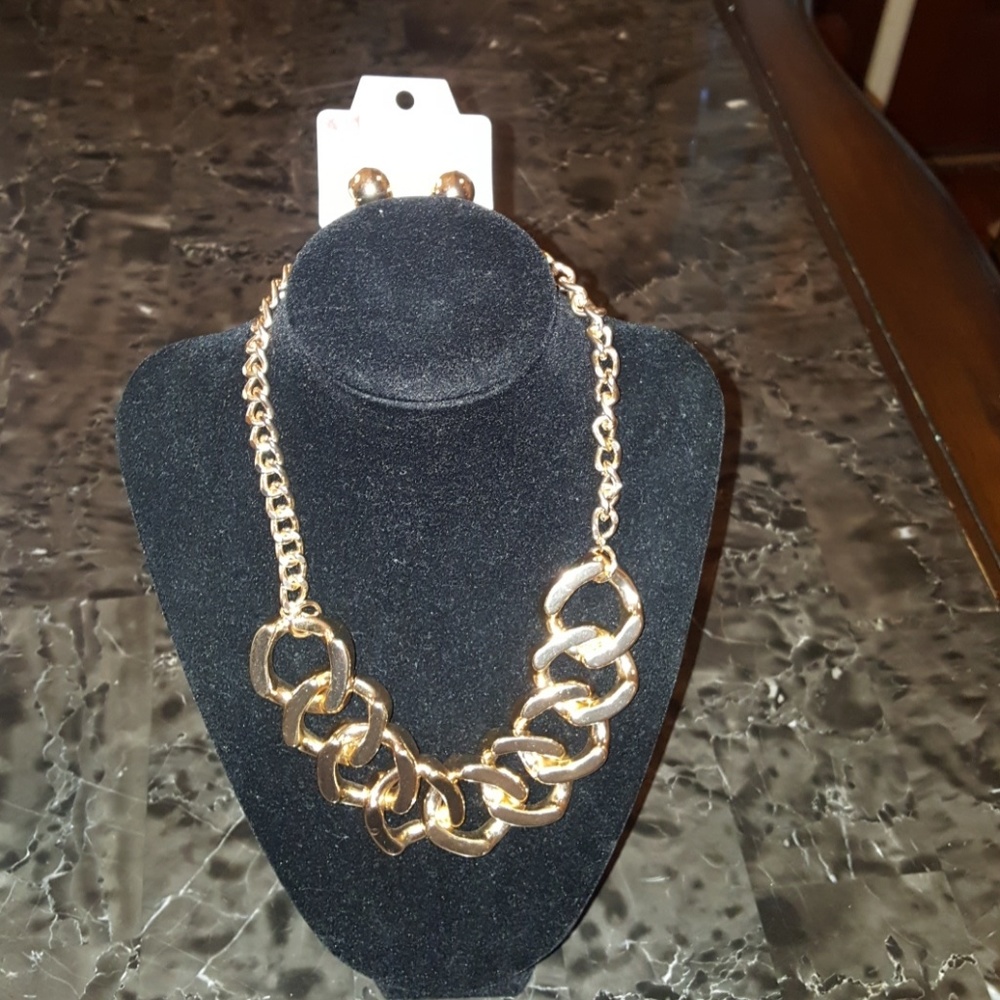 Gold necklace with gold ball earrings