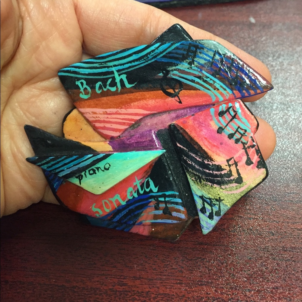 Large music brooch hand painted.Looks like ceramic