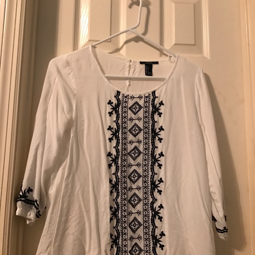 White and blue blouse