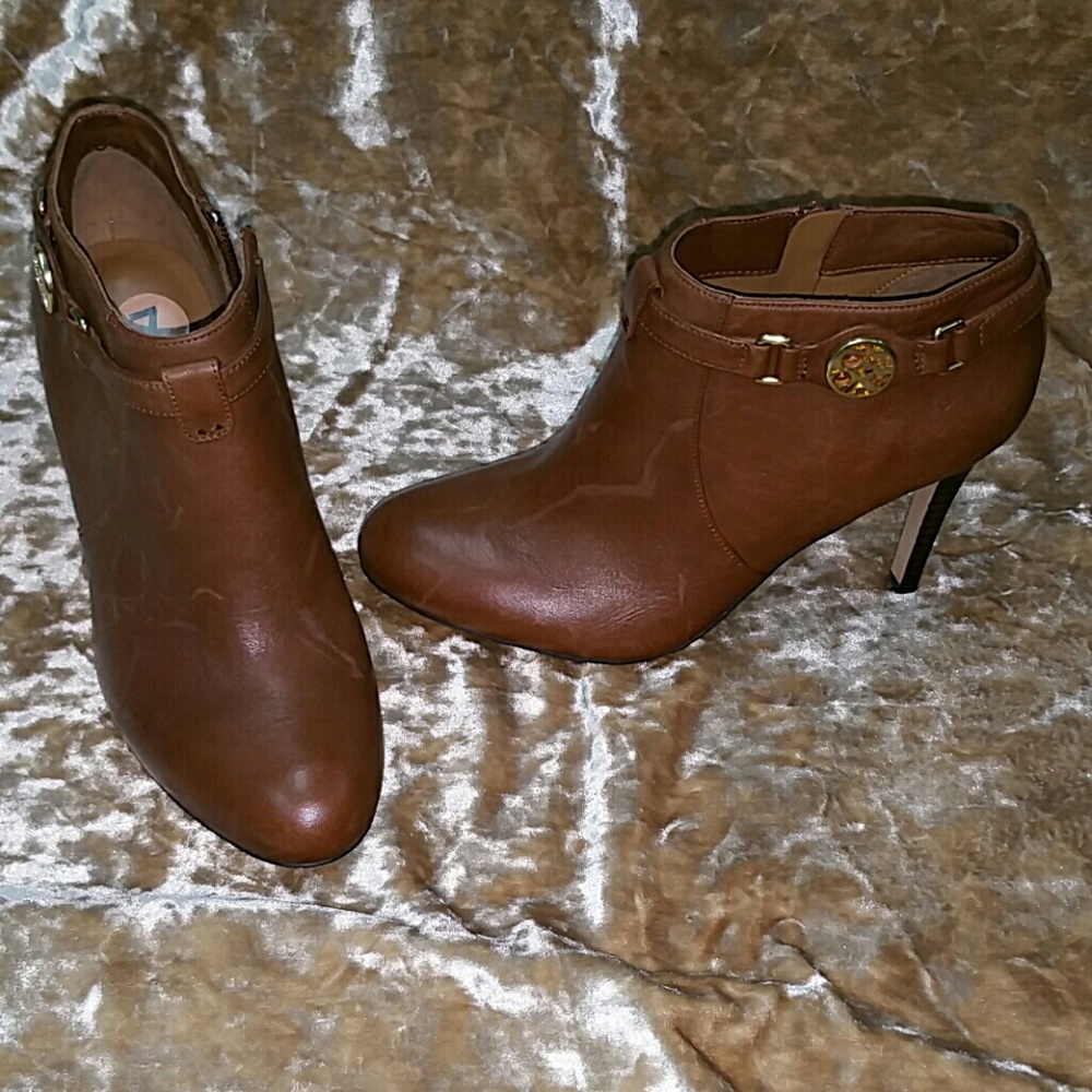 Brand new Coach high heeled leather booties