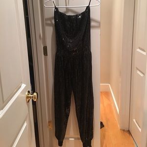 Super hot jumpsuit from bebe. New without tags.