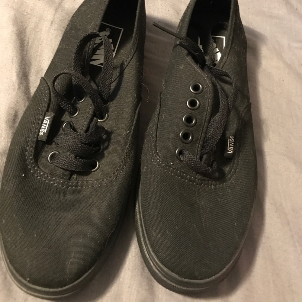 Black on black vans.