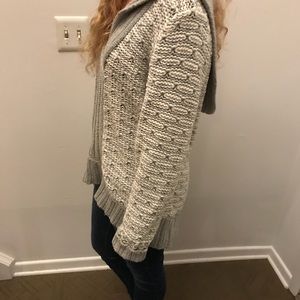 Snuggle up in this soft hooded sweater!