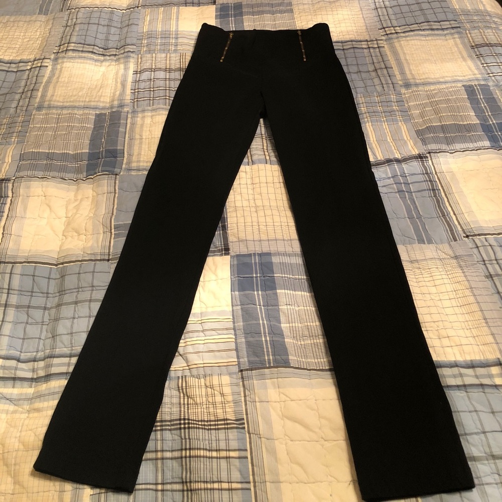 Black stretchy slacks.
