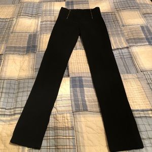Black stretchy slacks.
