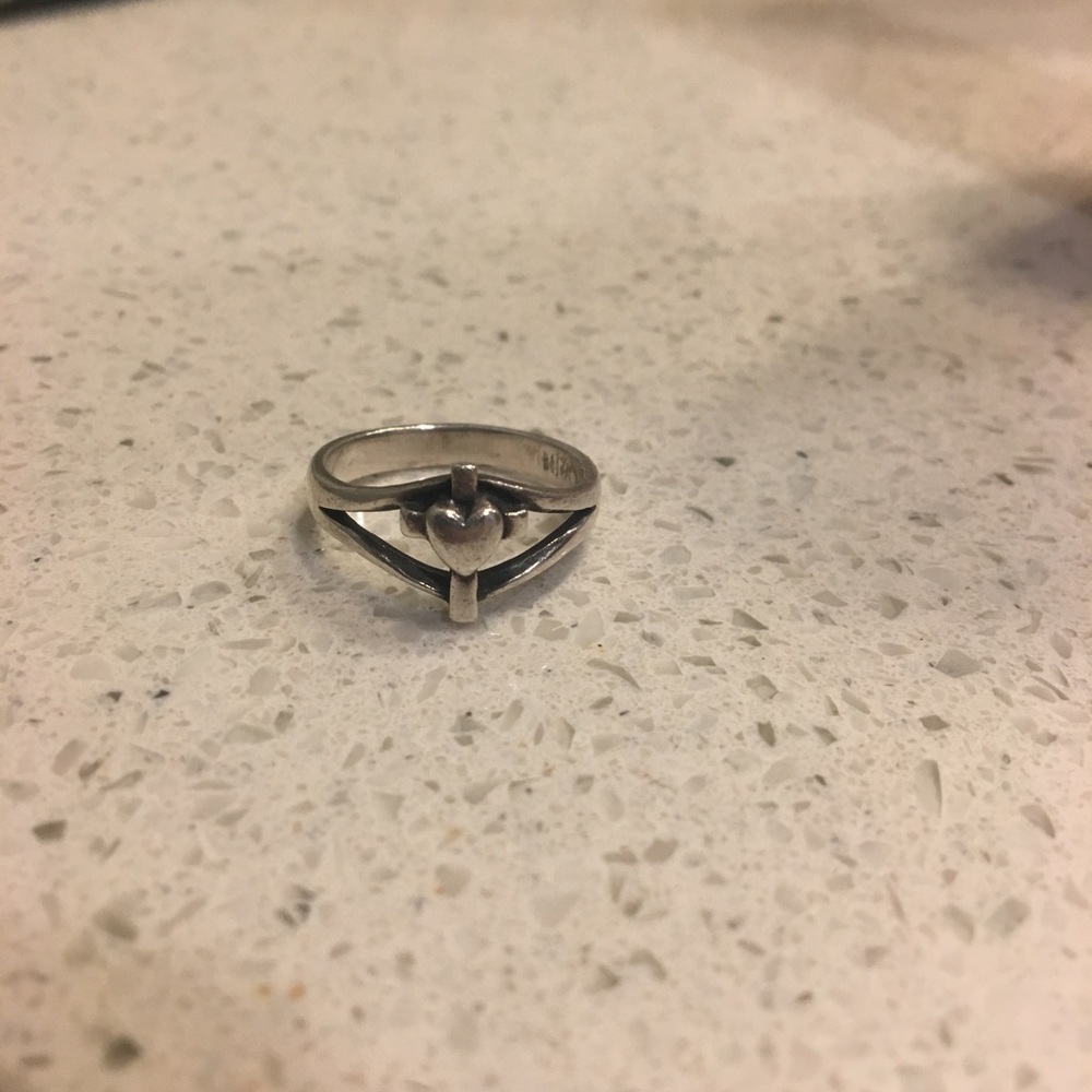 Heart cross ring.