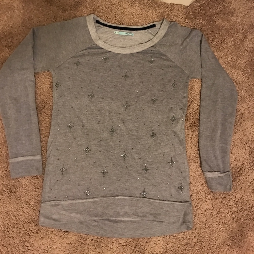 Grey Maurice’s sweater