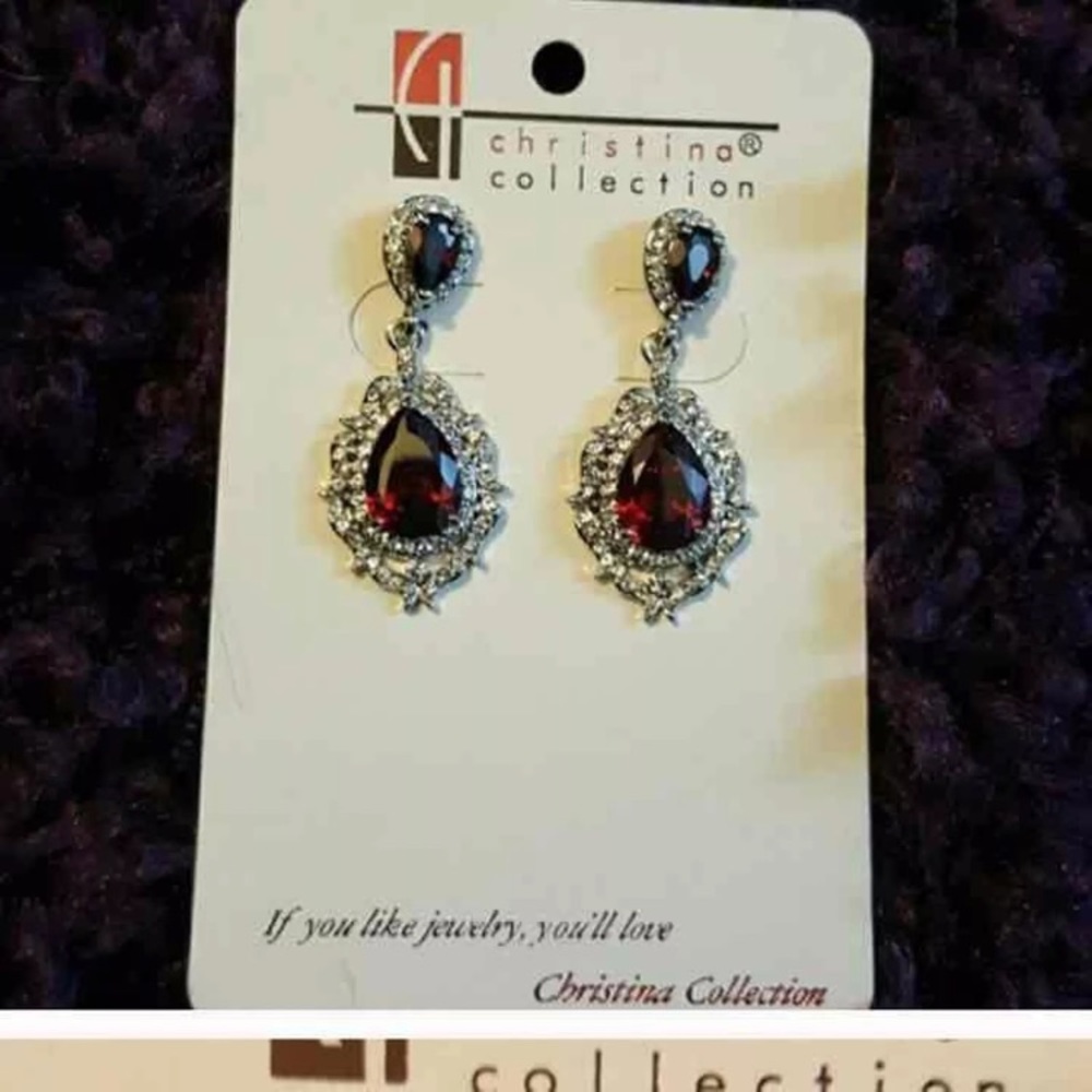 Red statement earrings