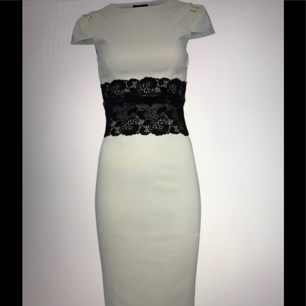 Beautiful cream dress with black lace mid section