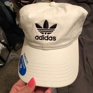 NWT-White women’s Adidas hat. Adjustable.