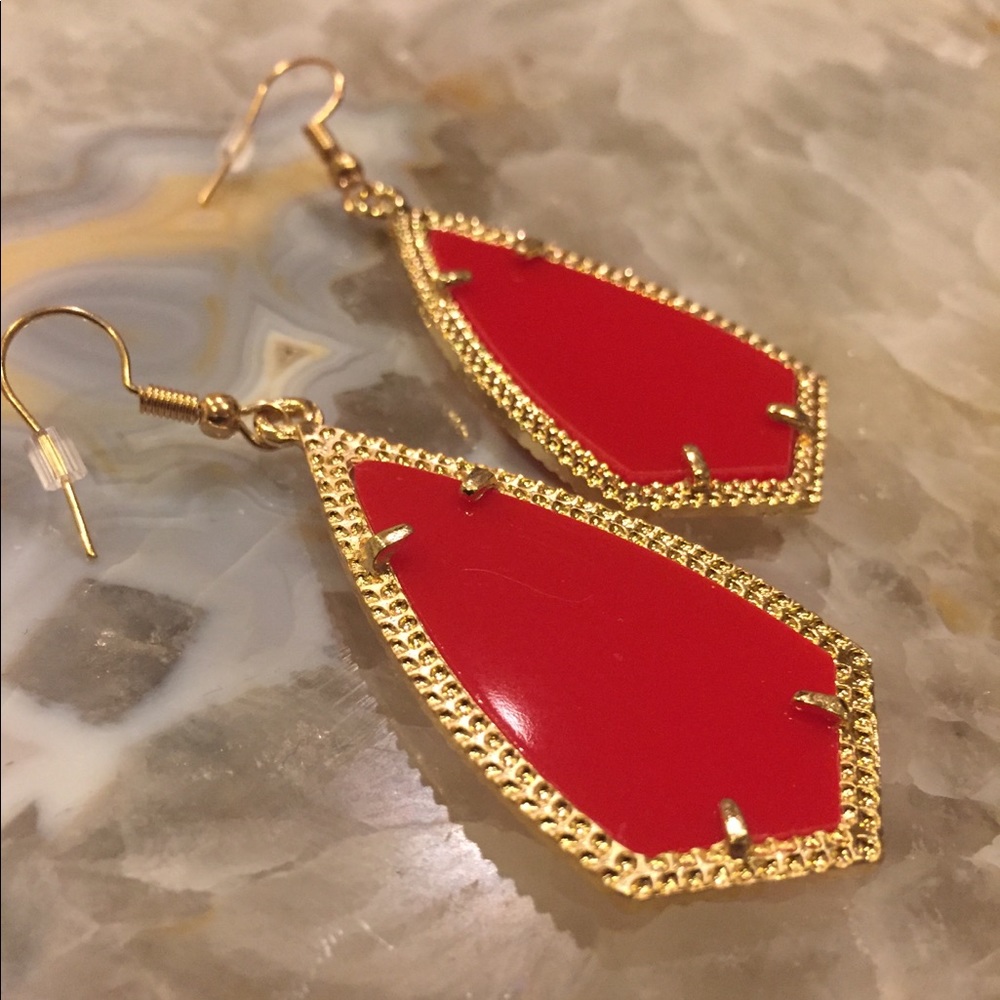 Red with gold earrings
