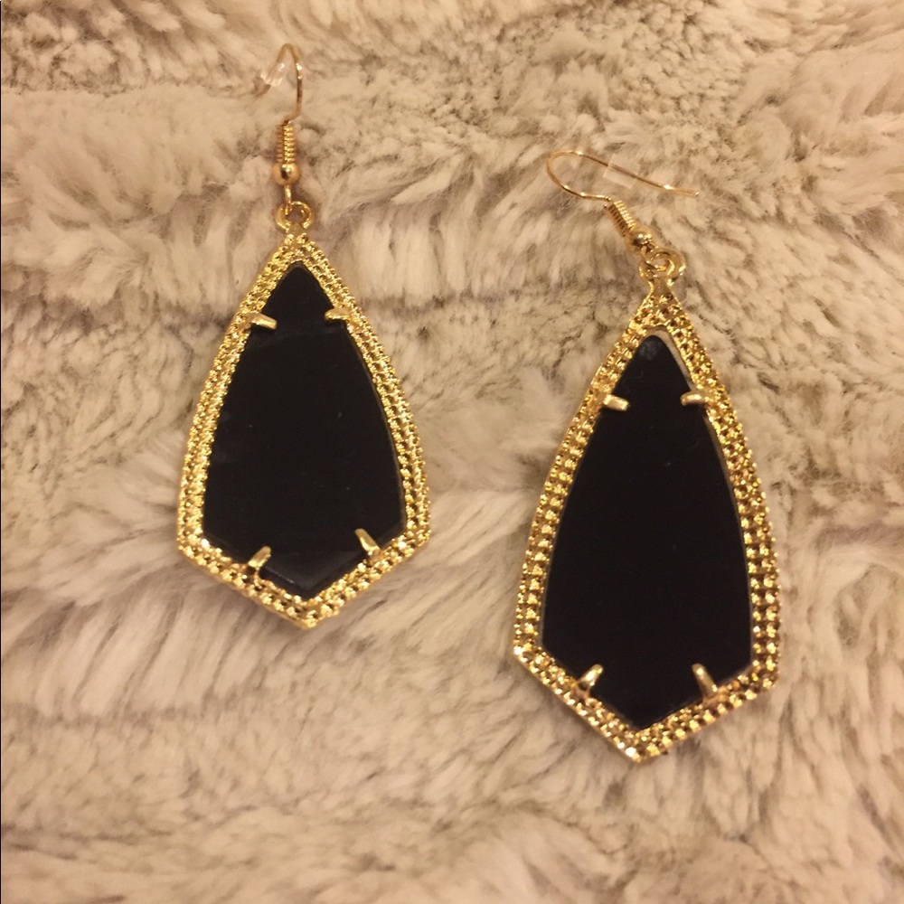 Black with gold earrings