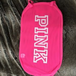 Pink laundry basket.