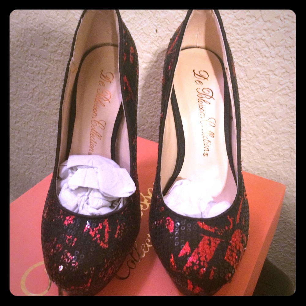 De Blossom red and black pumps.