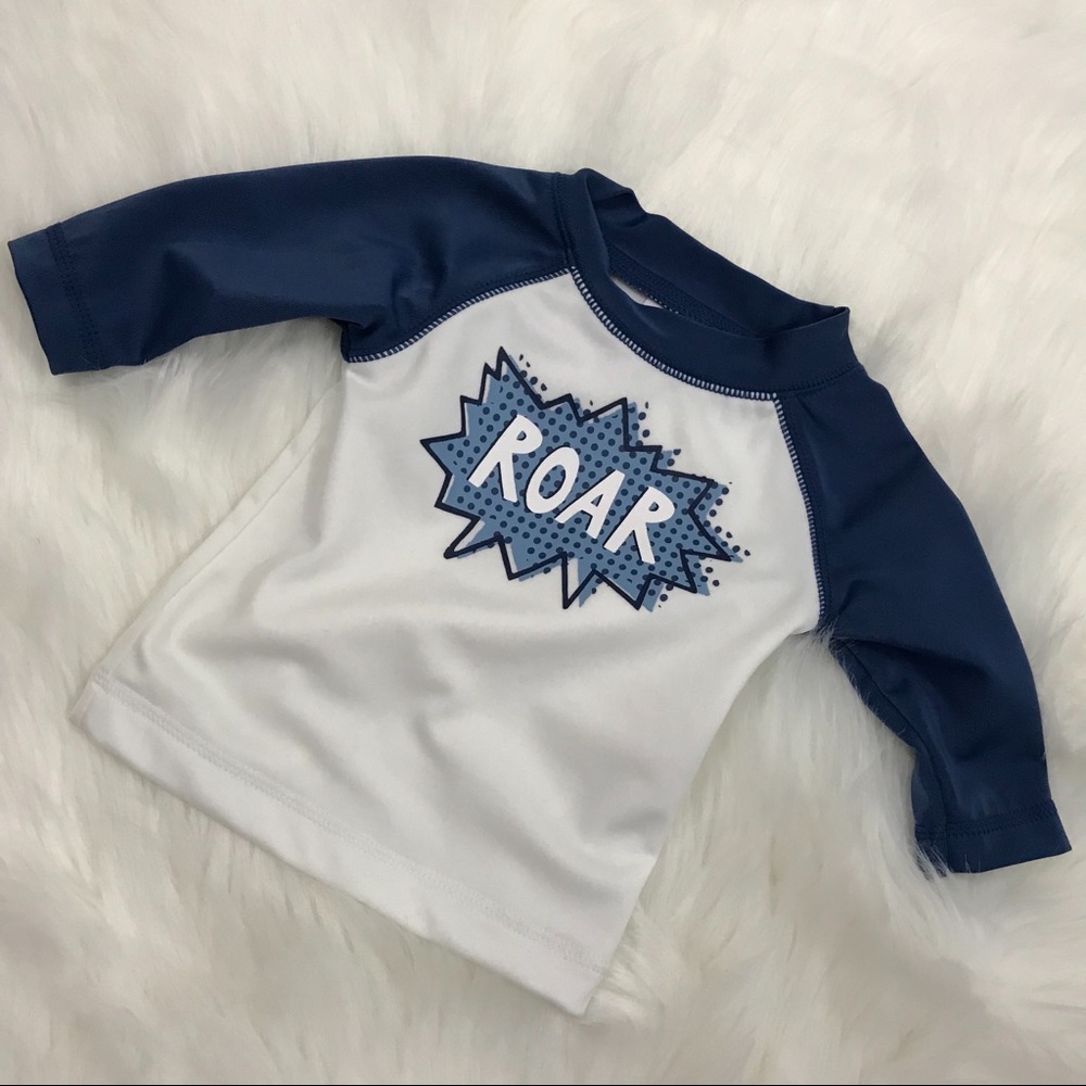 Gymboree boys swim shirt size 0-3 months.