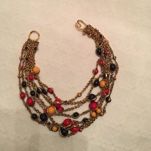 Gold metal necklace w/red, yellow, blue beads