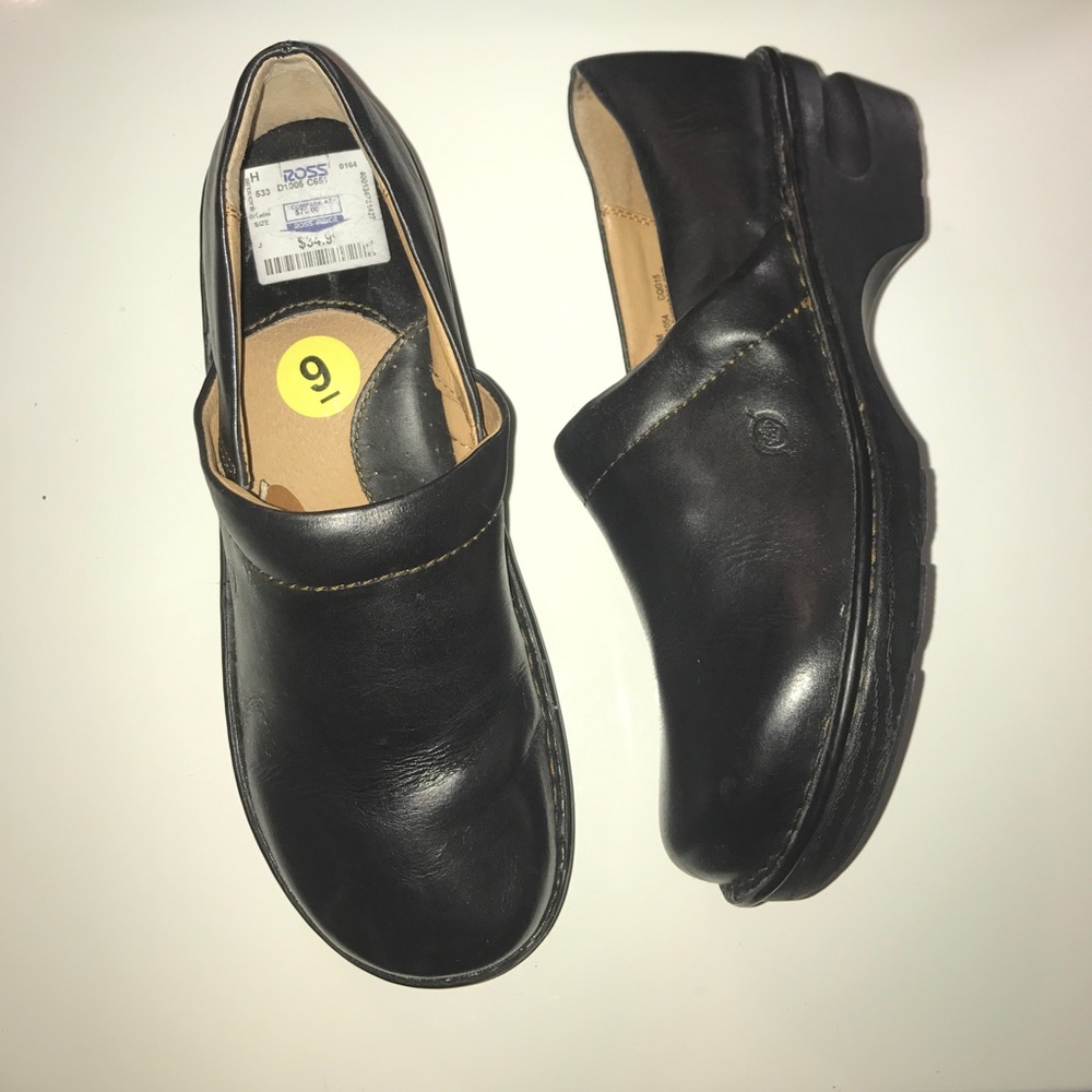 Born black leather clogs