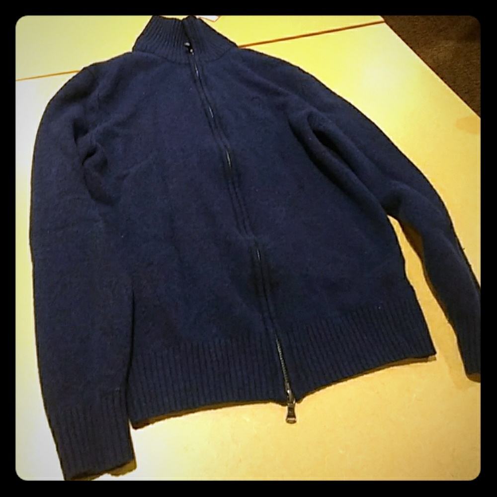 Selling a McNeal sweater .