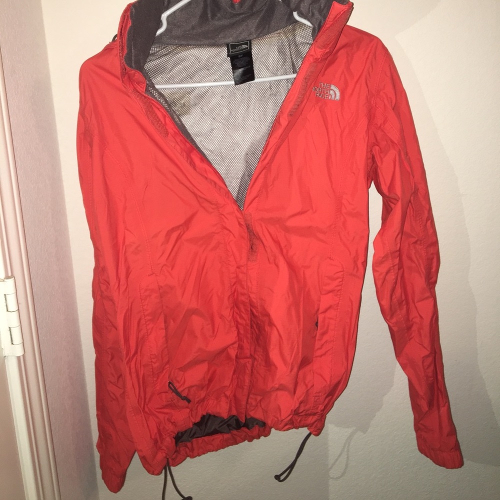 Orange North Face windbreaker