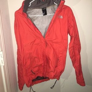 Orange North Face windbreaker