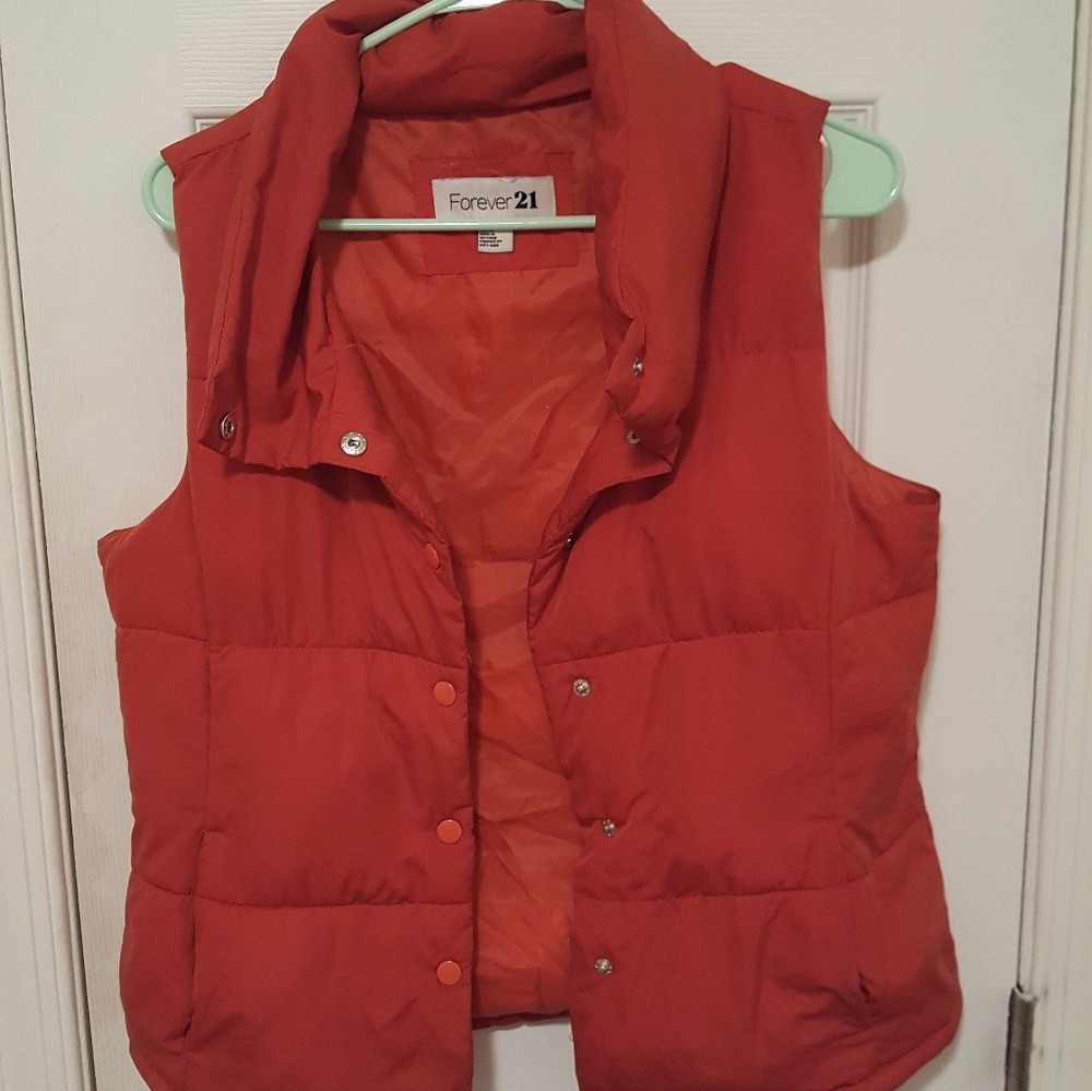 Gently used rust-colored Forever 21 puffer/vest!