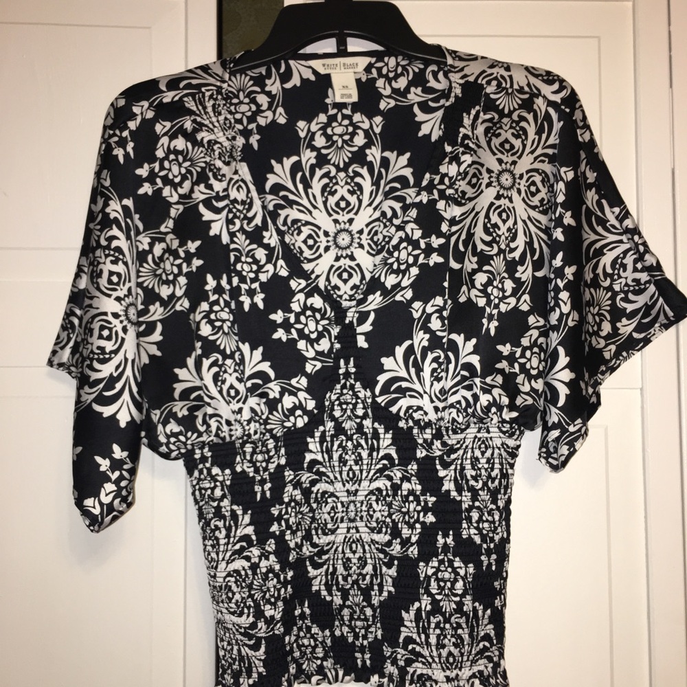 White house  black market top figure flattering