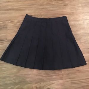 Navy pleated mini skirt