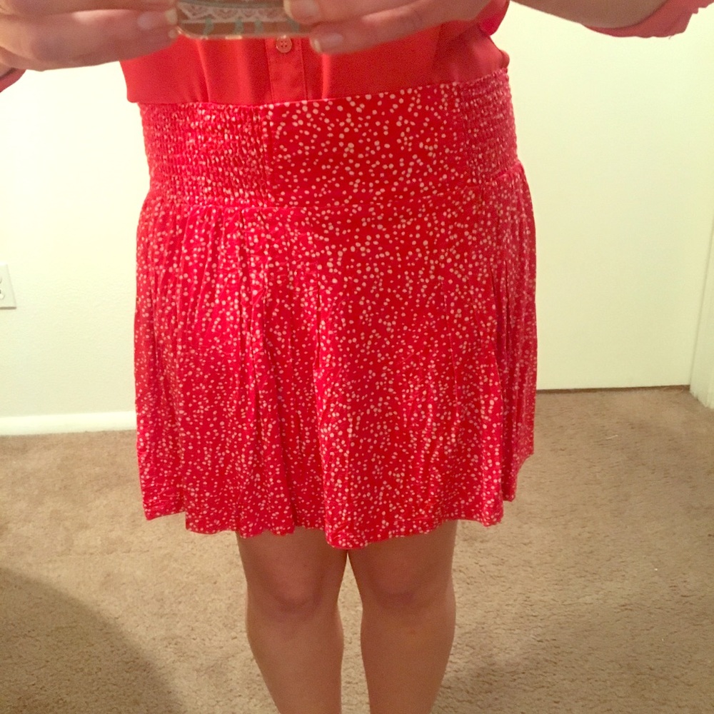 Red mini skirt with white dots.