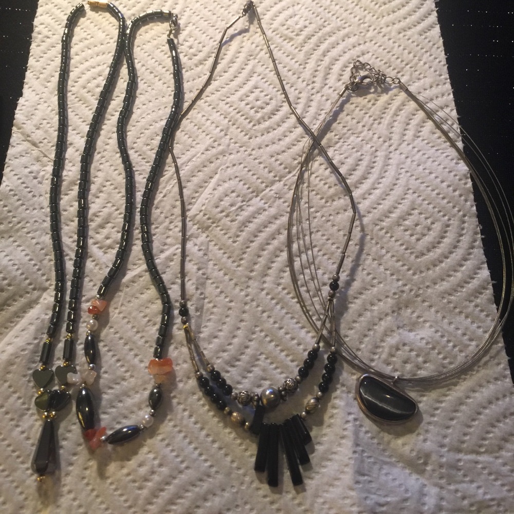 Lot of four multimedia necklaces