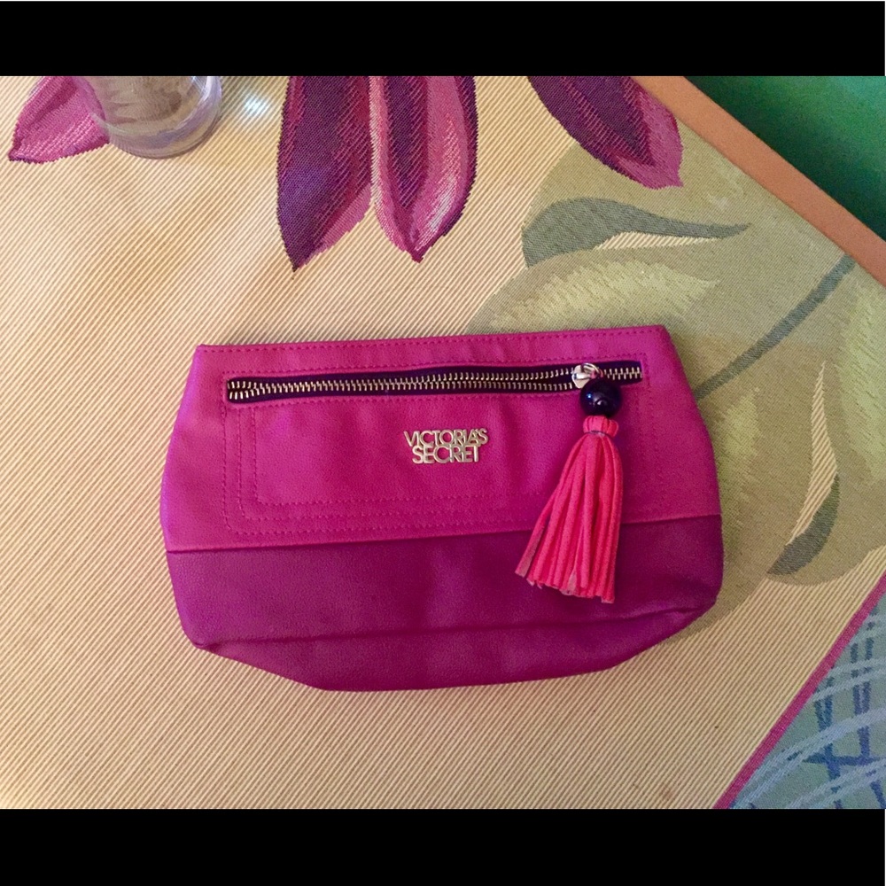 Victoria's Secret pink leather clutch with tassel