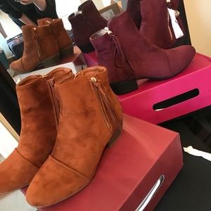 Two pairs of NEW boots.