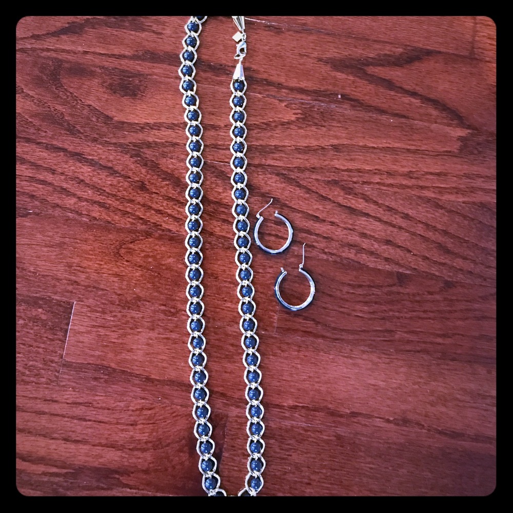 Gold and navy jewelry set. Long necklace and hoops