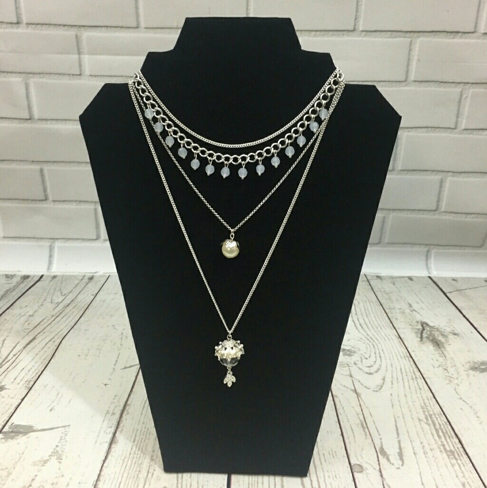 Four tiered silver necklace