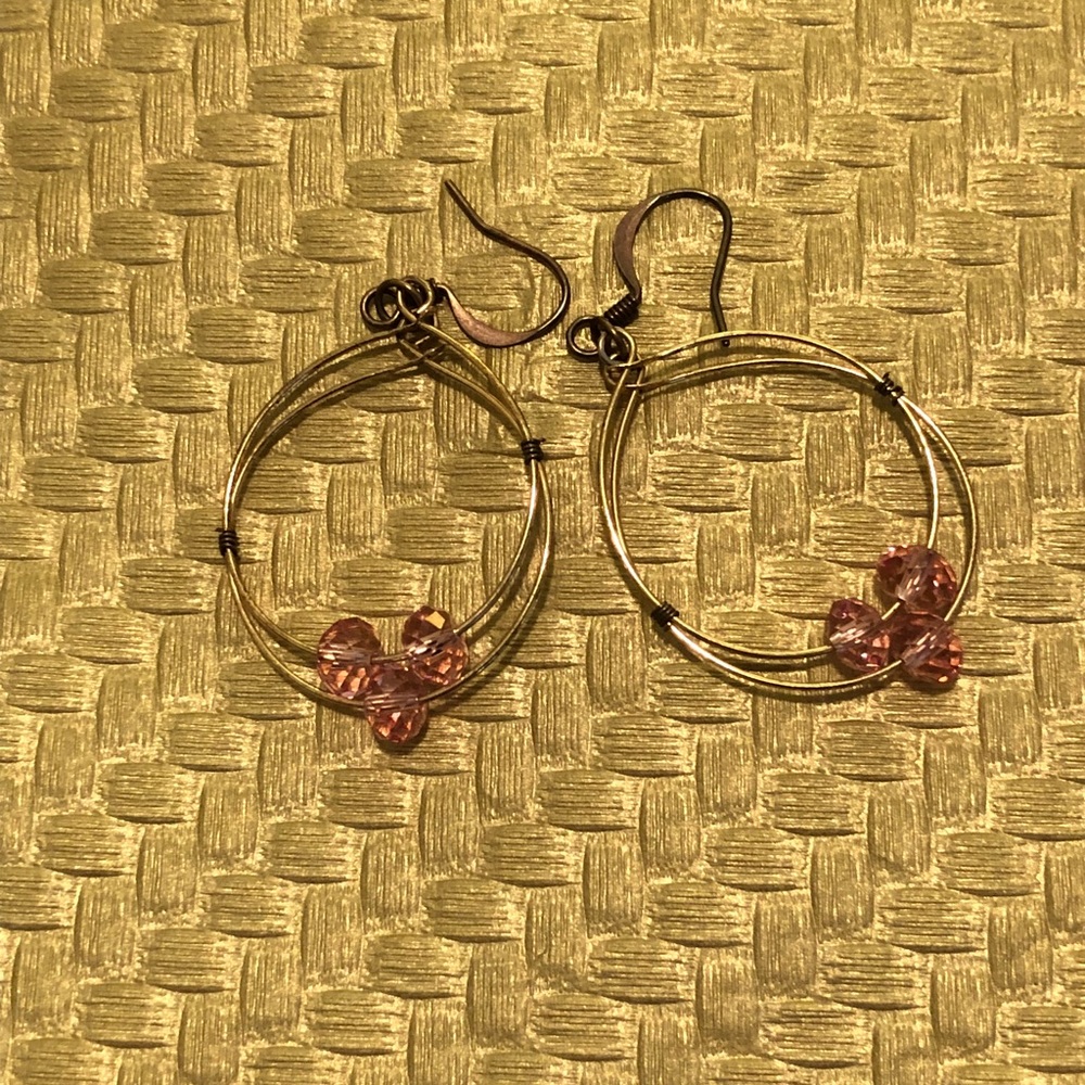 Gold earrings with pink crystal