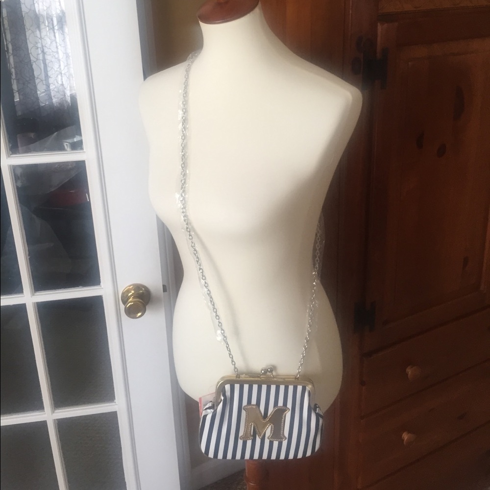 Melie Bianco KISS clutch or crossbody bag.